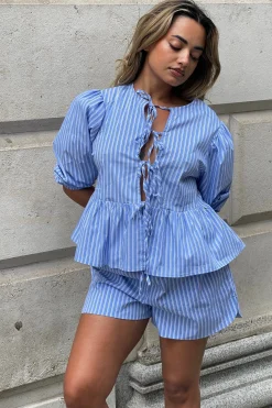 Glamorous Jet Setter|Chic Escapes|Blue-Stripe Tie-Front Peplum Top -